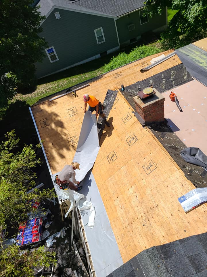 STATE GENERAL CONTRACTOR INC team and work vehicle in Somerville